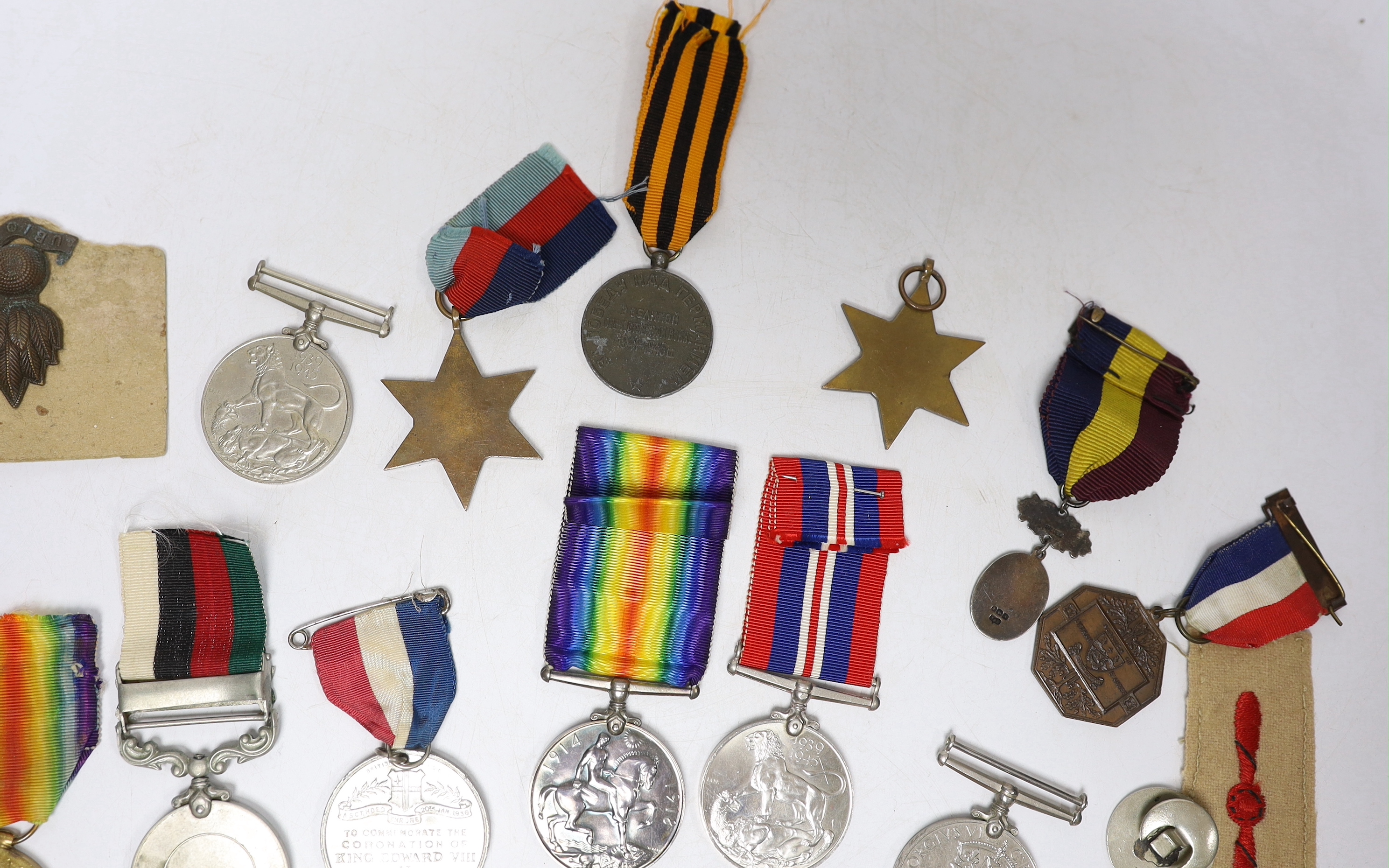 Twelve medals including; a British War Medal, a Victory Medal, three 1939-45 War Medals, two 1939-45 Stars, an Edward VIII Coronation Medal, a Soviet Stalin Victory medal, a Pakistan General Service Medal, a George VI Co